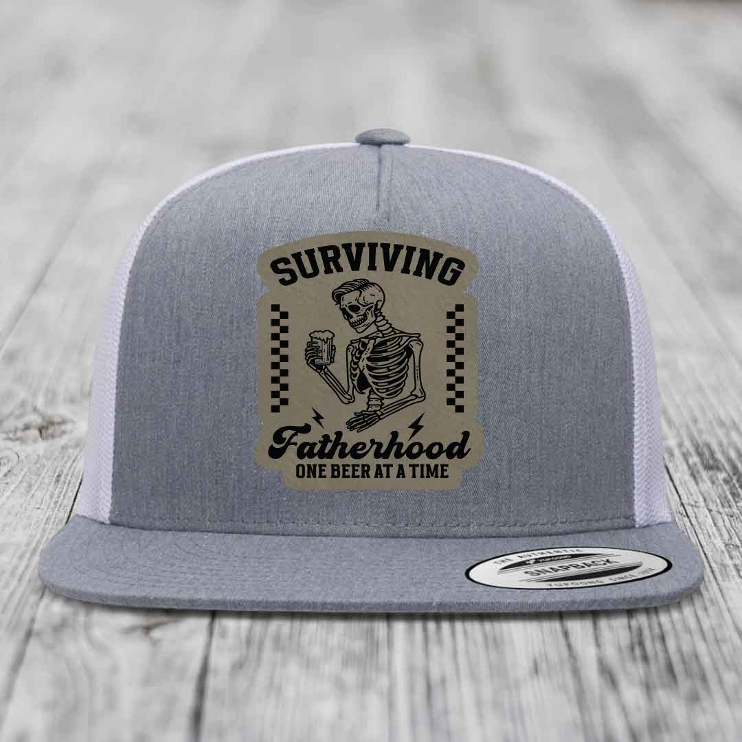 Surviving Fatherhood, One Beer At A Time - Leather Patch Hat - Light Brown to Black Patch - Yupoong 6006 Snapback Flatbill Hat