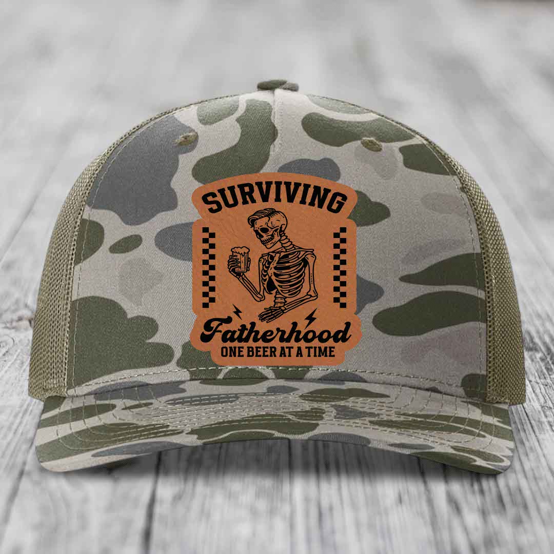 Surviving Fatherhood, One Beer At A Time - Leather Patch Hat - Rawhide to Black Patch - Richardson 112PFP Snapback Trucker Hat