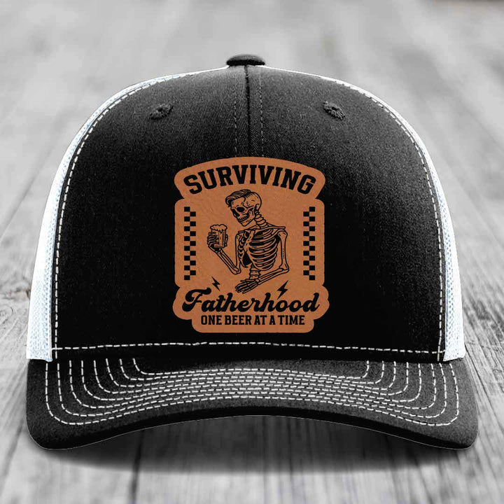 Surviving Fatherhood, One Beer At A Time - Leather Patch Hat - Rawhide to Black Patch - Richardson 112 Snapback Trucker Hat