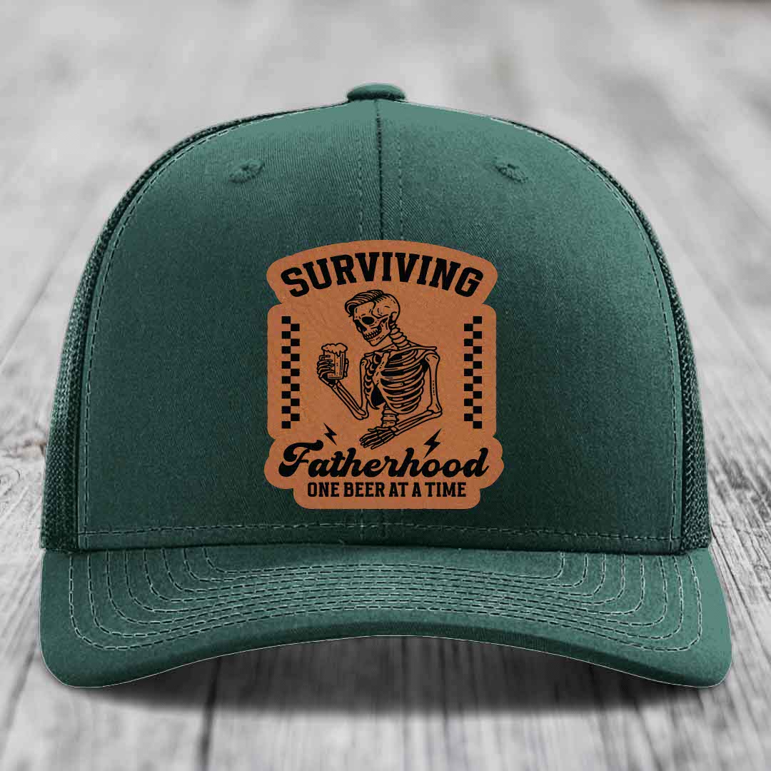 Surviving Fatherhood, One Beer At A Time - Leather Patch Hat - Rawhide to Black Patch - Richardson 112 Snapback Trucker Hat