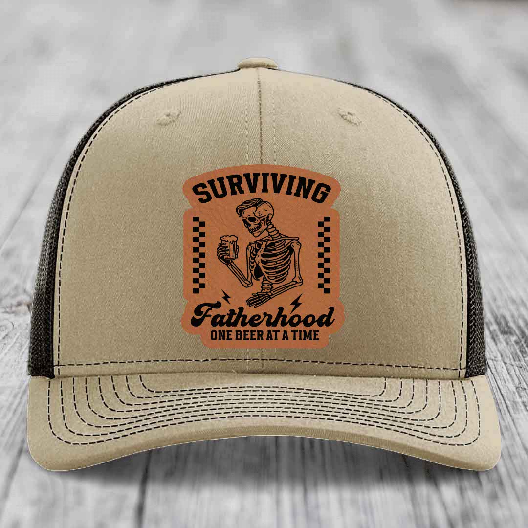 Surviving Fatherhood, One Beer At A Time - Leather Patch Hat - Rawhide to Black Patch - Richardson 112 Snapback Trucker Hat