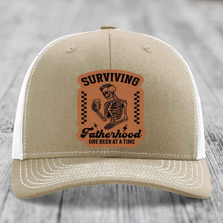 Surviving Fatherhood, One Beer At A Time - Leather Patch Hat - Rawhide to Black Patch - Richardson 112 Snapback Trucker Hat