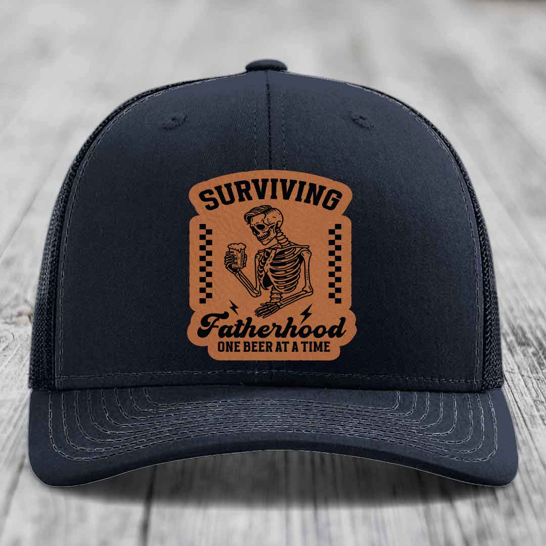 Surviving Fatherhood, One Beer At A Time - Leather Patch Hat - Rawhide to Black Patch - Richardson 112 Snapback Trucker Hat