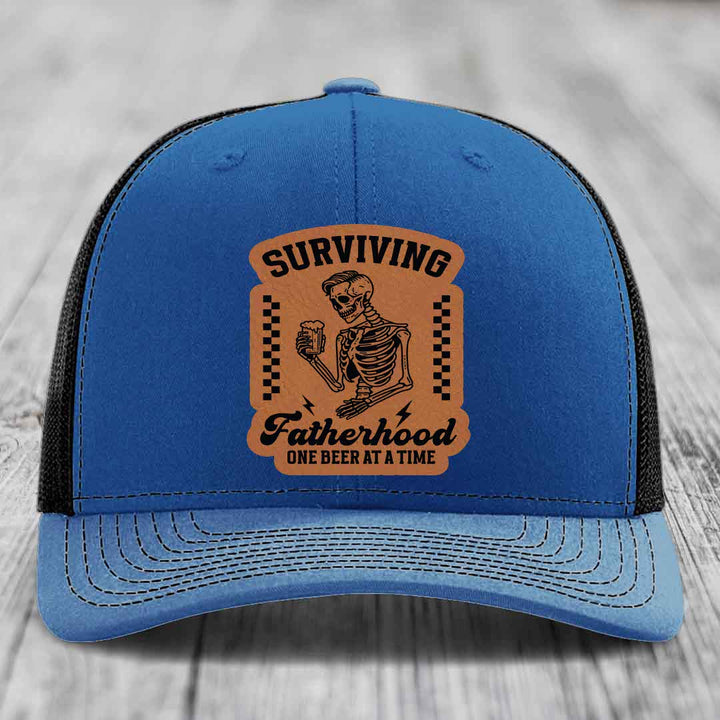 Surviving Fatherhood, One Beer At A Time - Leather Patch Hat - Rawhide to Black Patch - Richardson 112 Snapback Trucker Hat