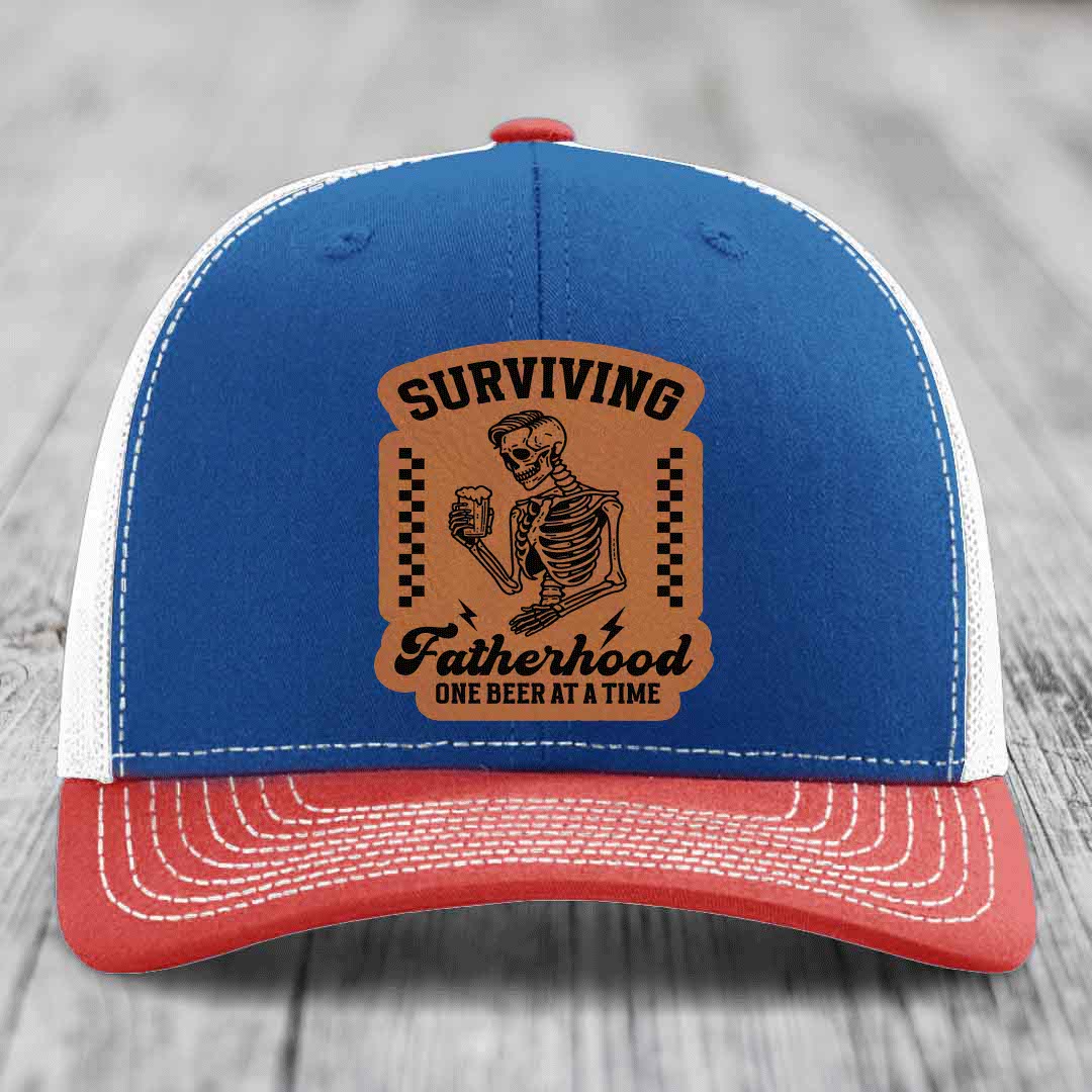 Surviving Fatherhood, One Beer At A Time - Leather Patch Hat - Rawhide to Black Patch - Richardson 112 Snapback Trucker Hat