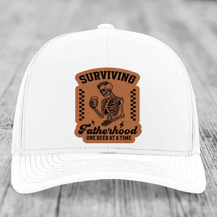 Surviving Fatherhood, One Beer At A Time - Leather Patch Hat - Rawhide to Black Patch - Richardson 112 Snapback Trucker Hat