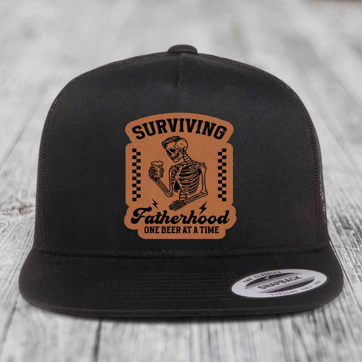 Surviving Fatherhood, One Beer At A Time - Leather Patch Hat - Rawhide to Black Patch - Yupoong 6006 Snapback Flatbill Hat