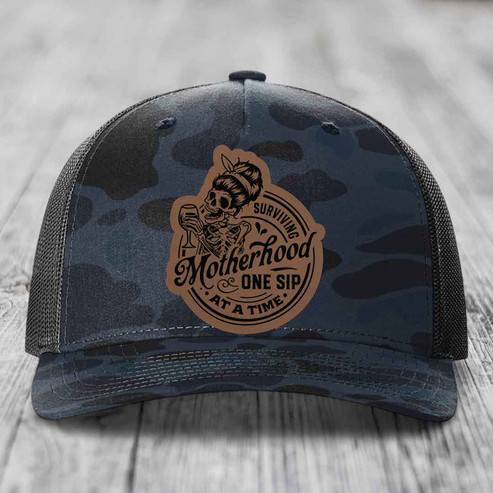 Surviving Motherhood, One Sip At A Time - Leather Patch Hat - Dark Brown to Black Patch - Richardson 112PFP Snapback Trucker Hat