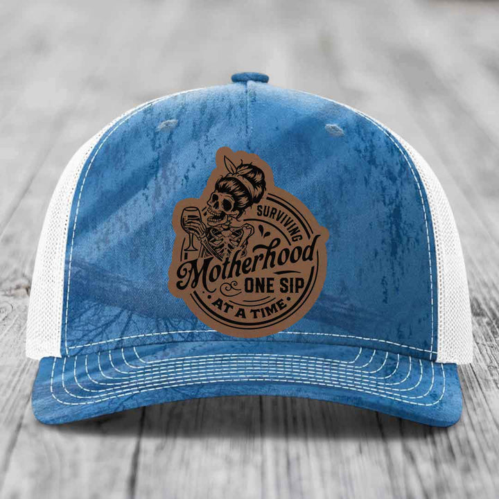 Surviving Motherhood, One Sip At A Time - Leather Patch Hat - Dark Brown to Black Patch - Richardson 112PFP Snapback Trucker Hat