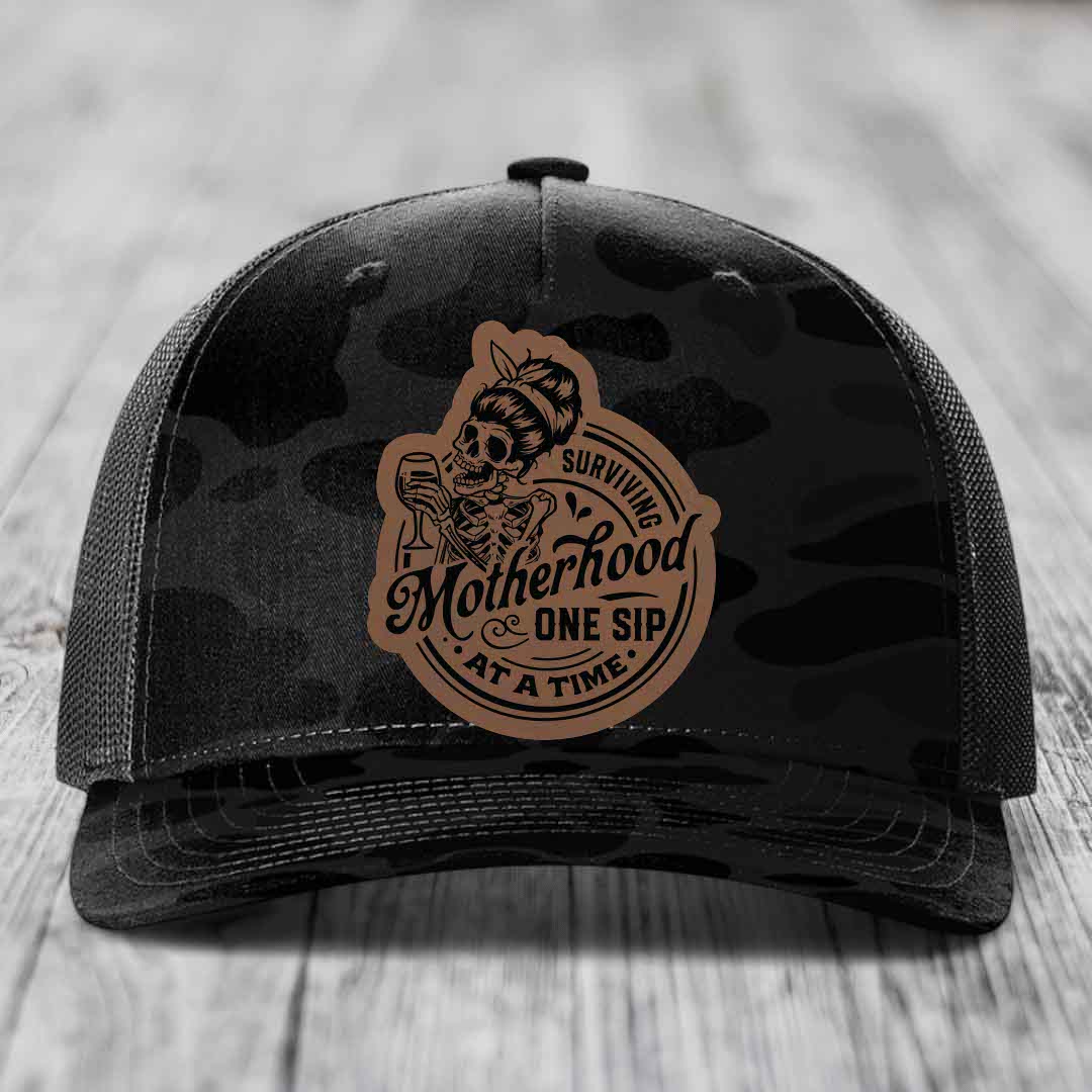 Surviving Motherhood, One Sip At A Time - Leather Patch Hat - Dark Brown to Black Patch - Richardson 112PFP Snapback Trucker Hat