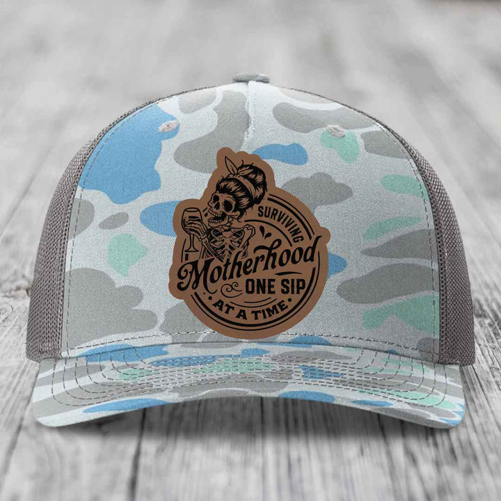 Surviving Motherhood, One Sip At A Time - Leather Patch Hat - Dark Brown to Black Patch - Richardson 112PFP Snapback Trucker Hat