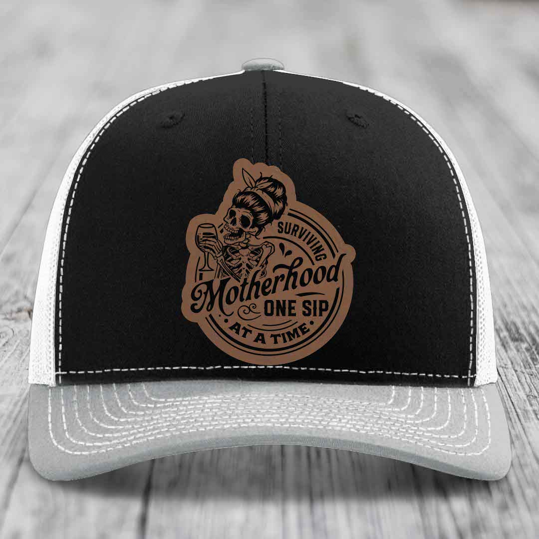 Surviving Motherhood, One Sip At A Time - Leather Patch Hat - Dark Brown to Black Patch - Richardson 112 Snapback Trucker Hat