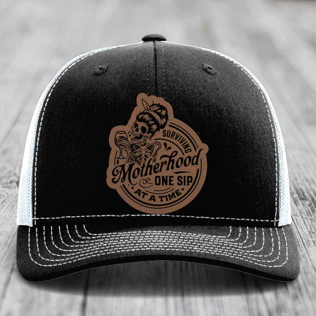 Surviving Motherhood, One Sip At A Time - Leather Patch Hat - Dark Brown to Black Patch - Richardson 112 Snapback Trucker Hat