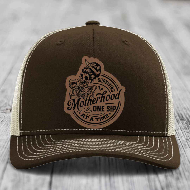 Surviving Motherhood, One Sip At A Time - Leather Patch Hat - Dark Brown to Black Patch - Richardson 112 Snapback Trucker Hat