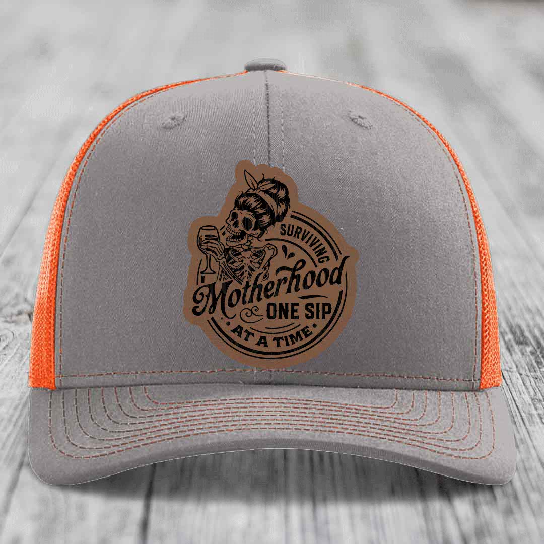 Surviving Motherhood, One Sip At A Time - Leather Patch Hat - Dark Brown to Black Patch - Richardson 112 Snapback Trucker Hat