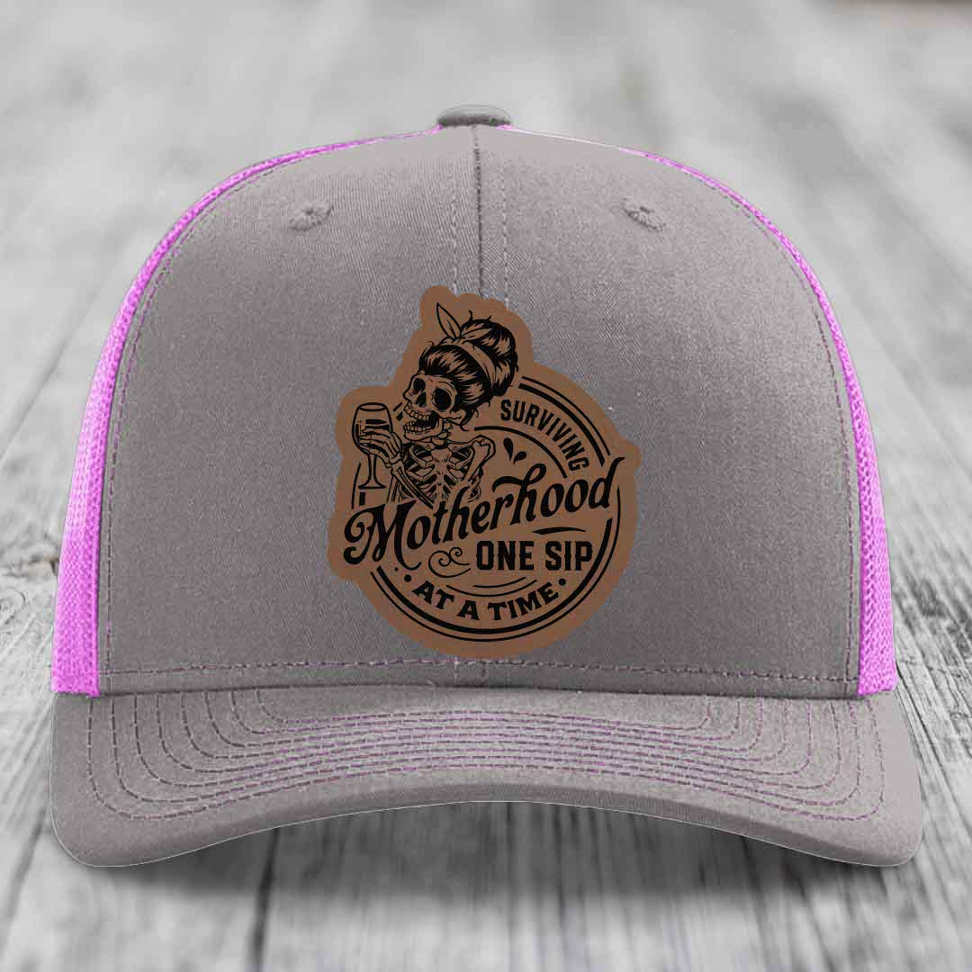 Surviving Motherhood, One Sip At A Time - Leather Patch Hat - Dark Brown to Black Patch - Richardson 112 Snapback Trucker Hat