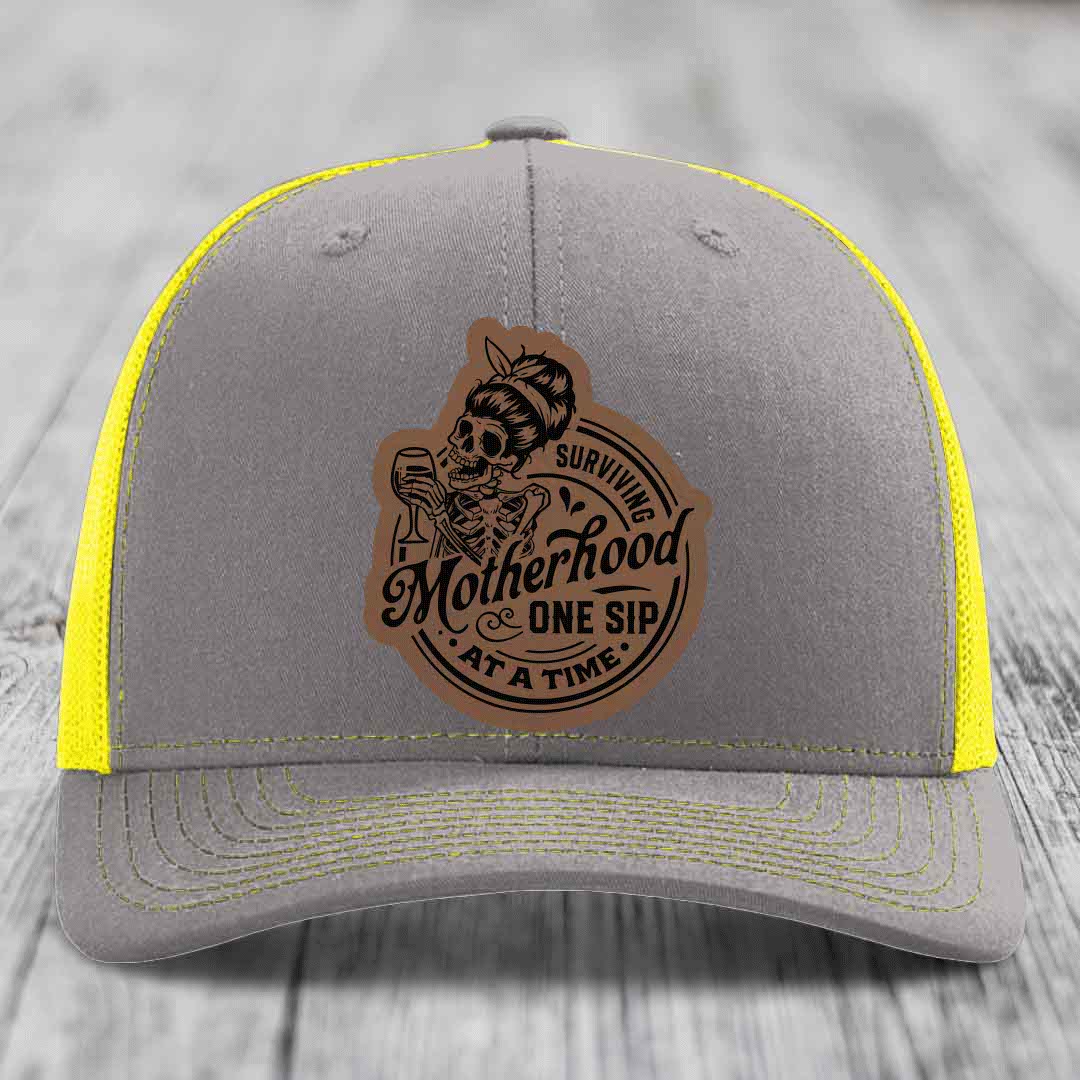 Surviving Motherhood, One Sip At A Time - Leather Patch Hat - Dark Brown to Black Patch - Richardson 112 Snapback Trucker Hat