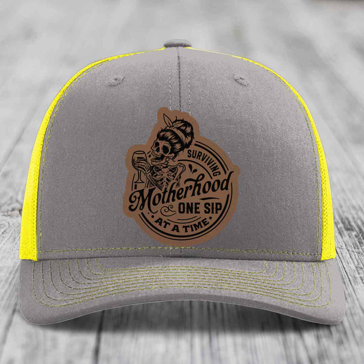 Surviving Motherhood, One Sip At A Time - Leather Patch Hat - Dark Brown to Black Patch - Richardson 112 Snapback Trucker Hat