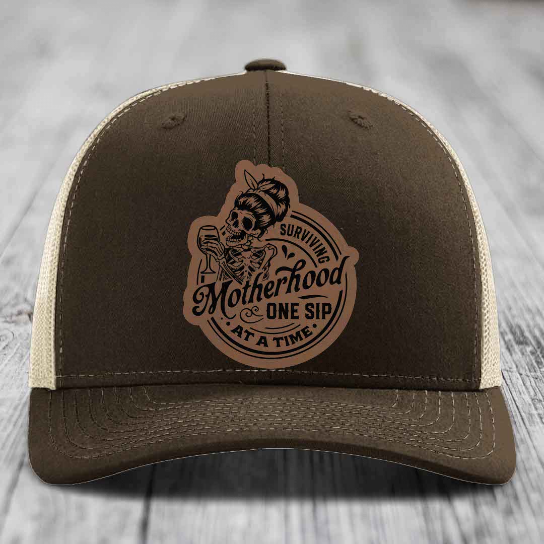 Surviving Motherhood, One Sip At A Time - Leather Patch Hat - Dark Brown to Black Patch - Richardson 112 Snapback Trucker Hat