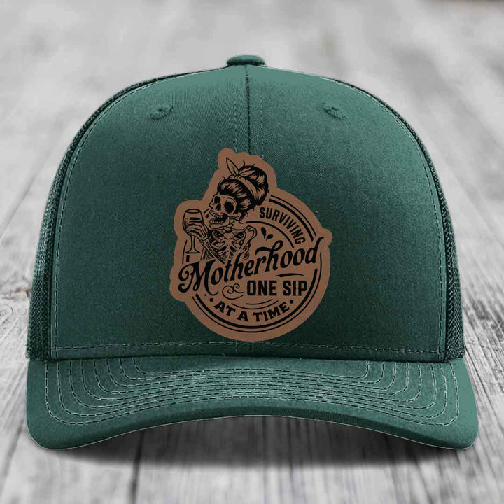 Surviving Motherhood, One Sip At A Time - Leather Patch Hat - Dark Brown to Black Patch - Richardson 112 Snapback Trucker Hat