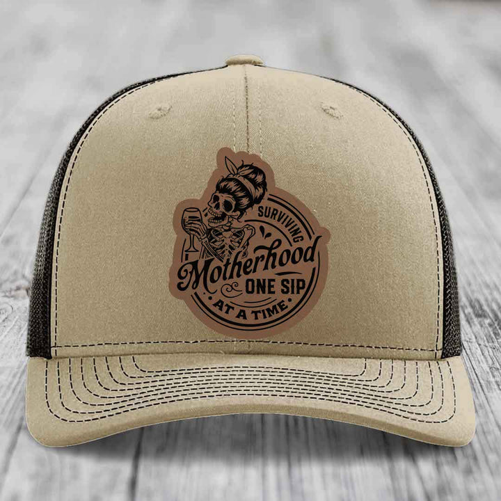 Surviving Motherhood, One Sip At A Time - Leather Patch Hat - Dark Brown to Black Patch - Richardson 112 Snapback Trucker Hat