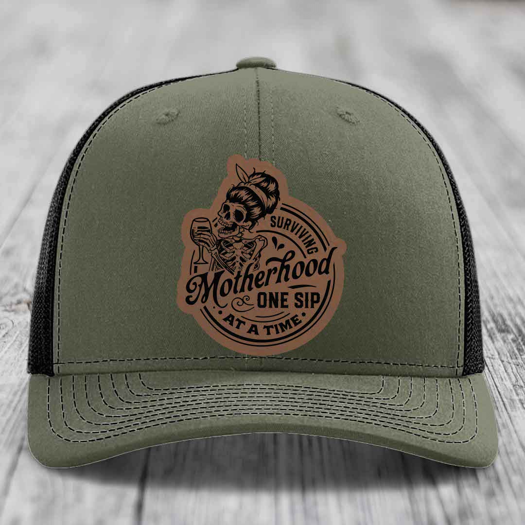Surviving Motherhood, One Sip At A Time - Leather Patch Hat - Dark Brown to Black Patch - Richardson 112 Snapback Trucker Hat