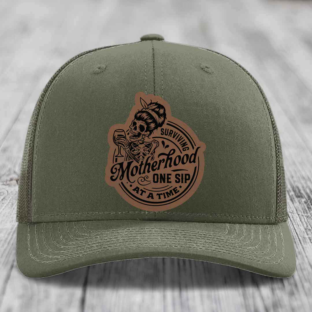 Surviving Motherhood, One Sip At A Time - Leather Patch Hat - Dark Brown to Black Patch - Richardson 112 Snapback Trucker Hat