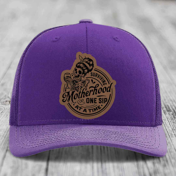 Surviving Motherhood, One Sip At A Time - Leather Patch Hat - Dark Brown to Black Patch - Richardson 112 Snapback Trucker Hat