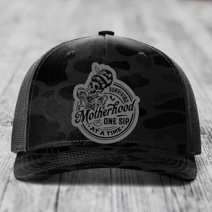 Surviving Motherhood, One Sip At A Time - Leather Patch Hat - Grey to Black Patch - Richardson 112PFP Snapback Trucker Hat