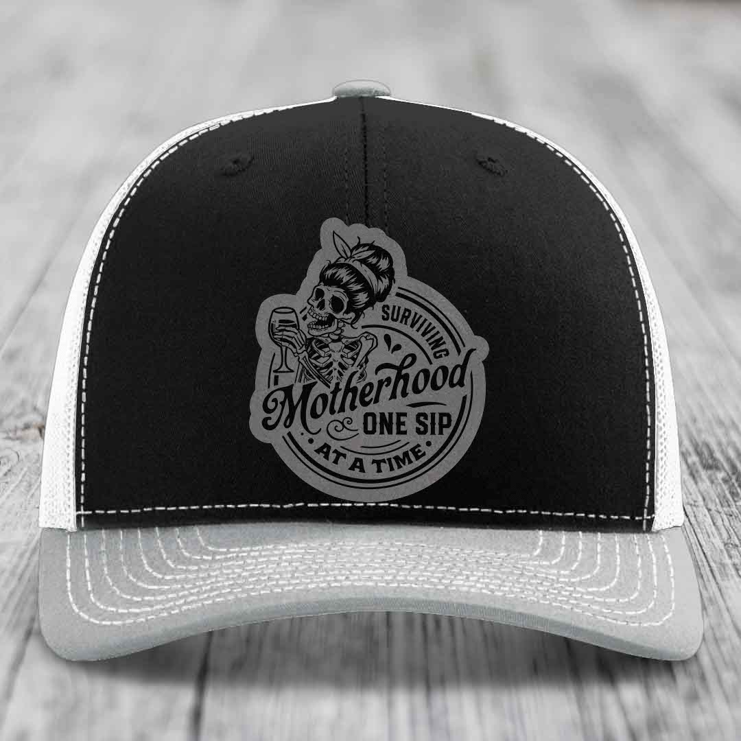 Surviving Motherhood, One Sip At A Time - Leather Patch Hat - Grey to Black Patch - Richardson 112 Snapback Trucker Hat