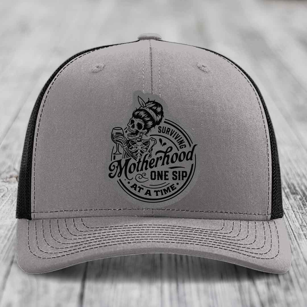 Surviving Motherhood, One Sip At A Time - Leather Patch Hat - Grey to Black Patch - Richardson 112 Snapback Trucker Hat