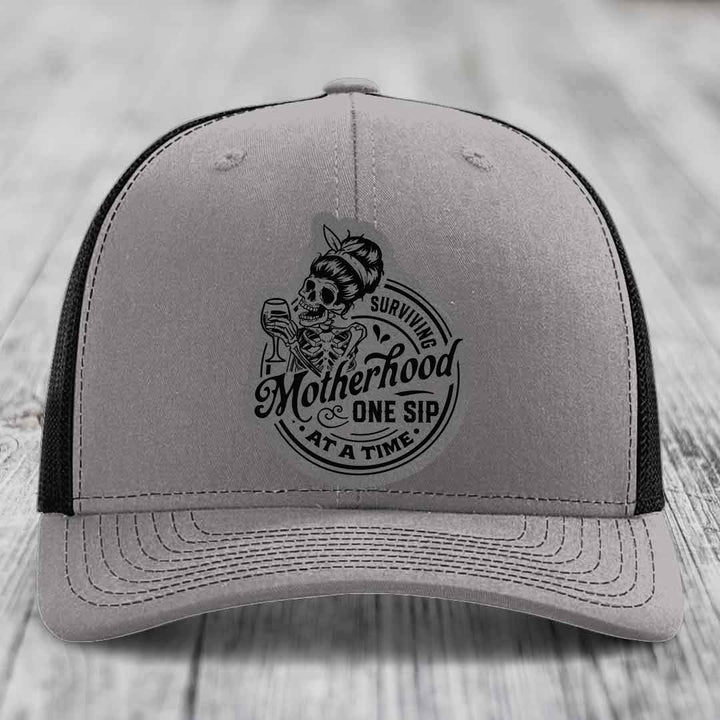 Surviving Motherhood, One Sip At A Time - Leather Patch Hat - Grey to Black Patch - Richardson 112 Snapback Trucker Hat