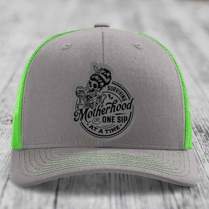 Surviving Motherhood, One Sip At A Time - Leather Patch Hat - Grey to Black Patch - Richardson 112 Snapback Trucker Hat