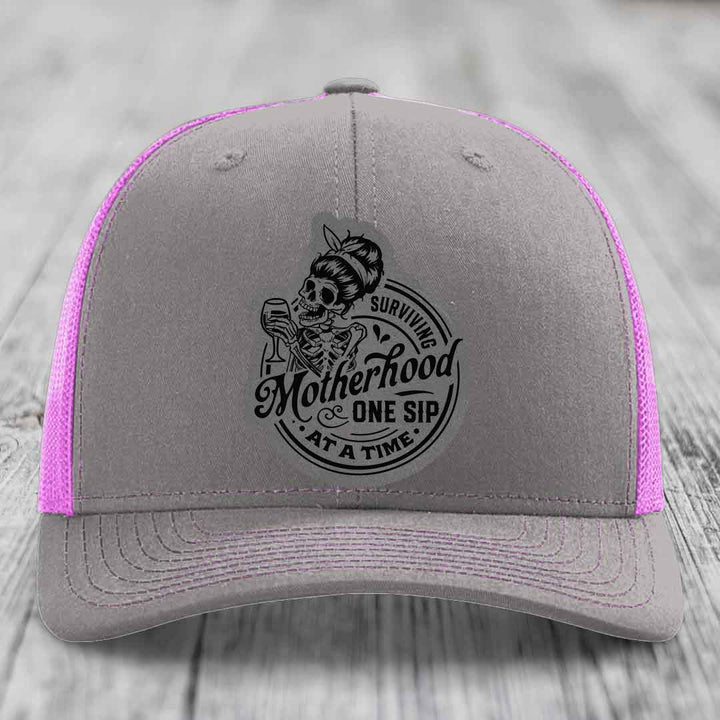 Surviving Motherhood, One Sip At A Time - Leather Patch Hat - Grey to Black Patch - Richardson 112 Snapback Trucker Hat