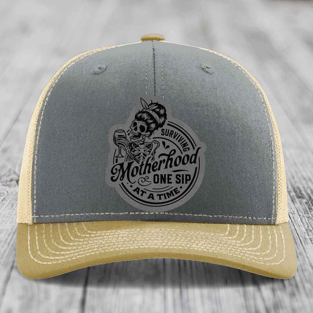 Surviving Motherhood, One Sip At A Time - Leather Patch Hat - Grey to Black Patch - Richardson 112 Snapback Trucker Hat