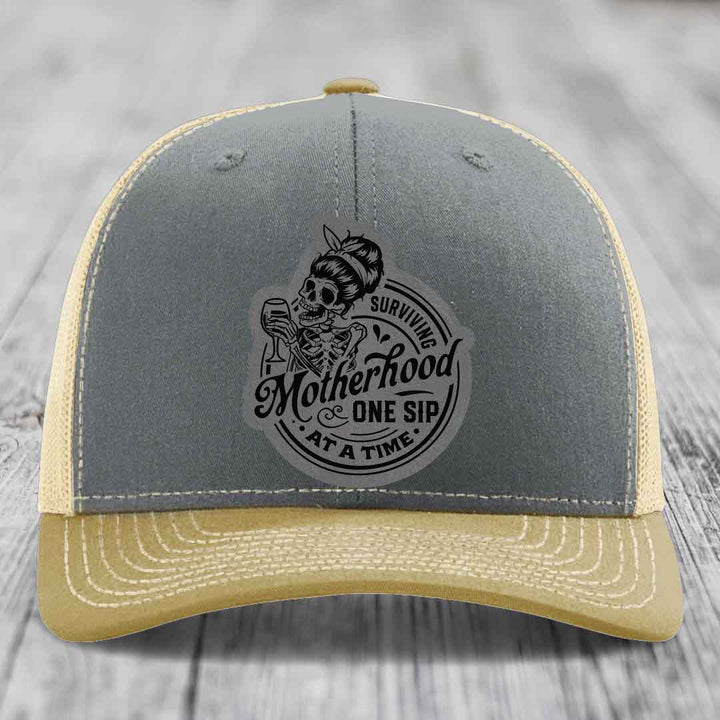 Surviving Motherhood, One Sip At A Time - Leather Patch Hat - Grey to Black Patch - Richardson 112 Snapback Trucker Hat