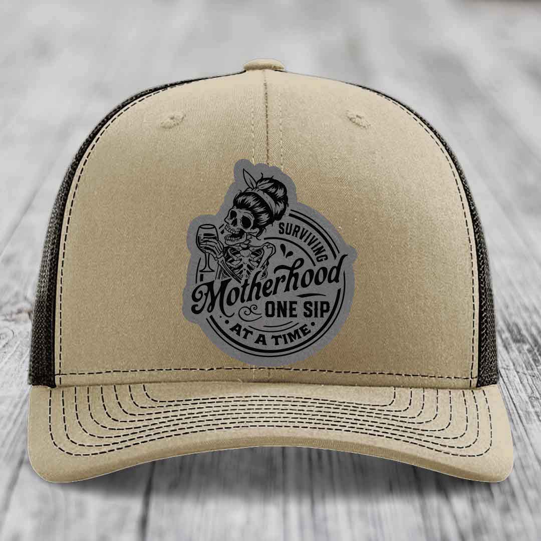 Surviving Motherhood, One Sip At A Time - Leather Patch Hat - Grey to Black Patch - Richardson 112 Snapback Trucker Hat