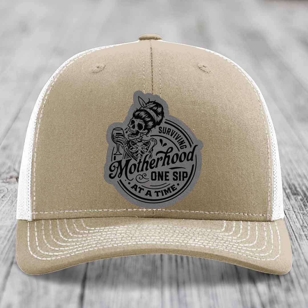 Surviving Motherhood, One Sip At A Time - Leather Patch Hat - Grey to Black Patch - Richardson 112 Snapback Trucker Hat