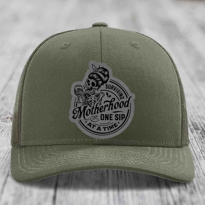 Surviving Motherhood, One Sip At A Time - Leather Patch Hat - Grey to Black Patch - Richardson 112 Snapback Trucker Hat