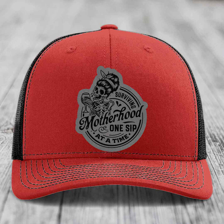 Surviving Motherhood, One Sip At A Time - Leather Patch Hat - Grey to Black Patch - Richardson 112 Snapback Trucker Hat
