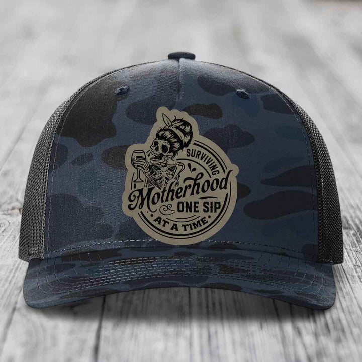 Surviving Motherhood, One Sip At A Time - Leather Patch Hat - Light Brown to Black Patch - Richardson 112PFP Snapback Trucker Hat