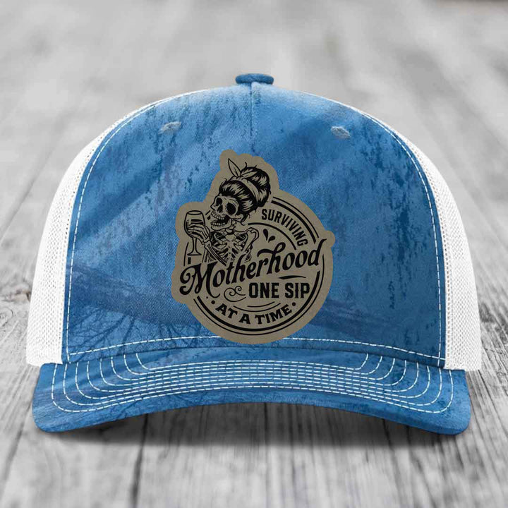 Surviving Motherhood, One Sip At A Time - Leather Patch Hat - Light Brown to Black Patch - Richardson 112PFP Snapback Trucker Hat