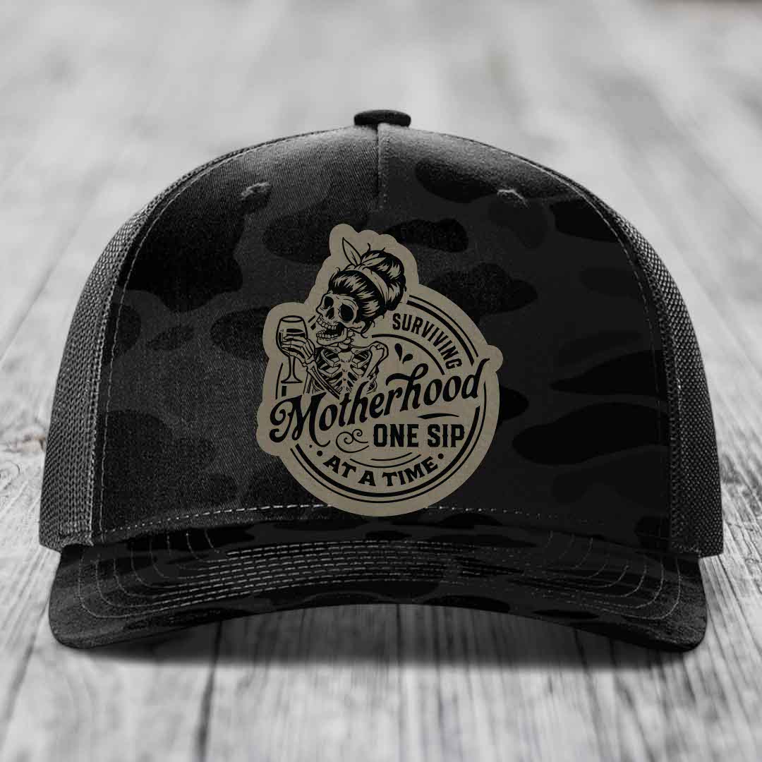 Surviving Motherhood, One Sip At A Time - Leather Patch Hat - Light Brown to Black Patch - Richardson 112PFP Snapback Trucker Hat