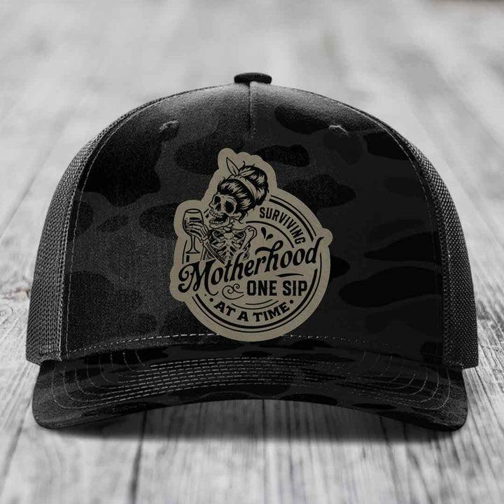 Surviving Motherhood, One Sip At A Time - Leather Patch Hat - Light Brown to Black Patch - Richardson 112PFP Snapback Trucker Hat