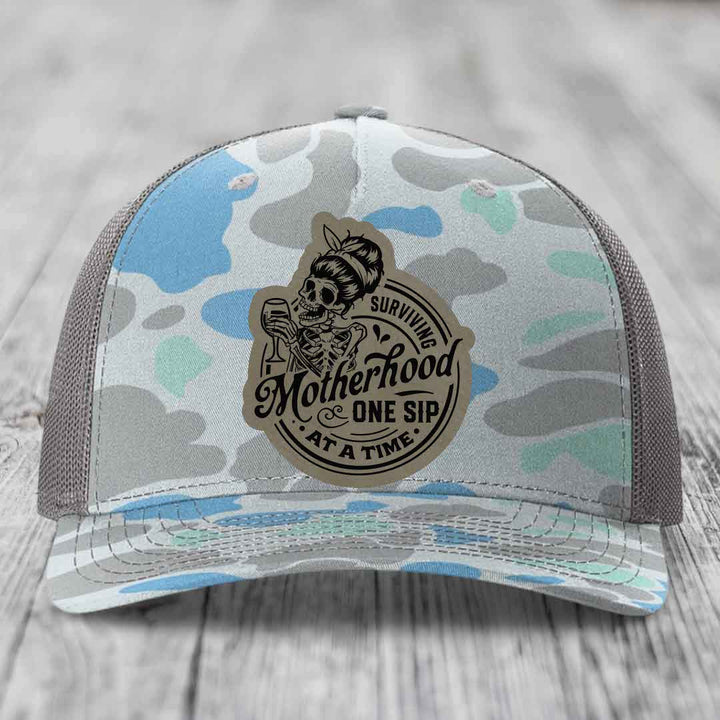 Surviving Motherhood, One Sip At A Time - Leather Patch Hat - Light Brown to Black Patch - Richardson 112PFP Snapback Trucker Hat