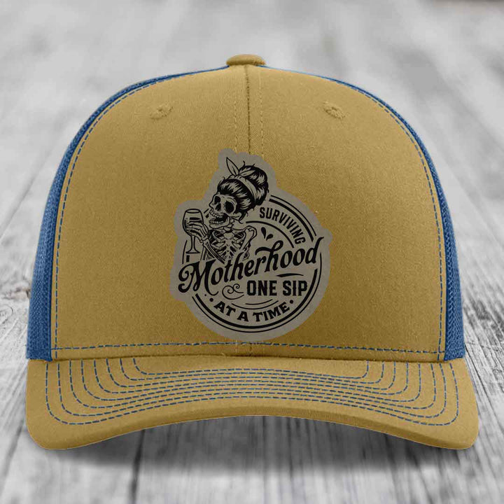 Surviving Motherhood, One Sip At A Time - Leather Patch Hat - Light Brown to Black Patch - Richardson 112 Snapback Trucker Hat