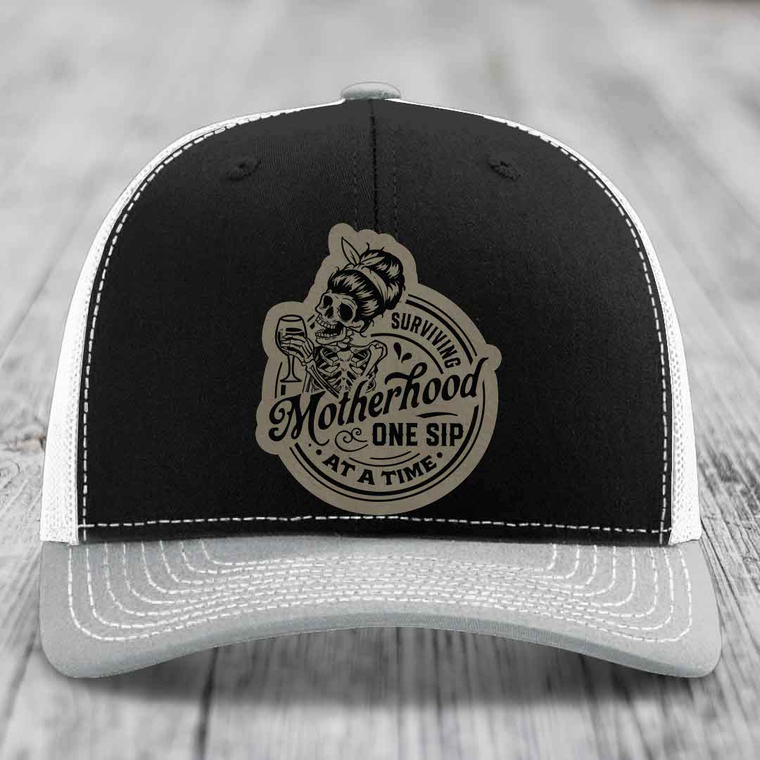 Surviving Motherhood, One Sip At A Time - Leather Patch Hat - Light Brown to Black Patch - Richardson 112 Snapback Trucker Hat