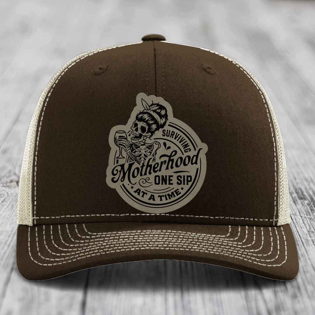 Surviving Motherhood, One Sip At A Time - Leather Patch Hat - Light Brown to Black Patch - Richardson 112 Snapback Trucker Hat