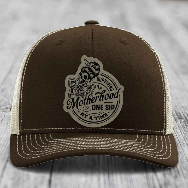 Surviving Motherhood, One Sip At A Time - Leather Patch Hat - Light Brown to Black Patch - Richardson 112 Snapback Trucker Hat