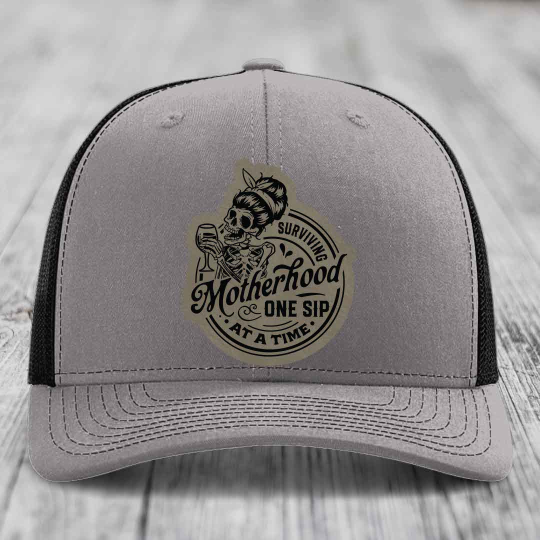 Surviving Motherhood, One Sip At A Time - Leather Patch Hat - Light Brown to Black Patch - Richardson 112 Snapback Trucker Hat